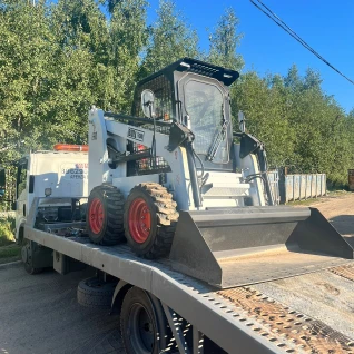 Колесный мини погрузчик Bull SL700