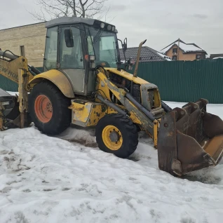 Эскаватор погрузчик  New Holland B 110