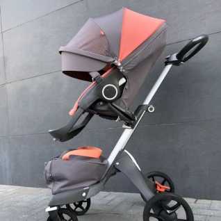Прогулочная коляска Stokke v5  Coral 12 кг