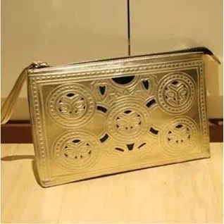 Клатч сумочка золотой кожаный