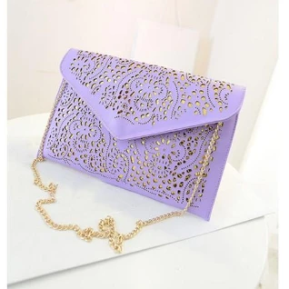 Сиреневая кожаная ажурная сумка клатч