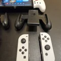 Возьмите Nintendo Switch OLED (док и 2 комплекта джойстиков) + Zelda TOTK, Ведьмак 3, Metro 2033, Alien Isolation и многое другое.  напрокат (Фото 3) в Москве