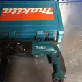 Возьмите Перфоратор Makita HR2450X8 SDS+ напрокат (Фото 2) в Москве
