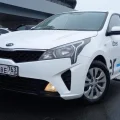 Возьмите Автомобиль Kia Rio 2022 Uber напрокат (Фото 1) в Санкт-Петербурге