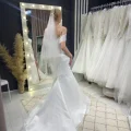 Возьмите Новое свадебное платье с фатой напрокат (Фото 1) в Москве