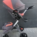 Возьмите Прогулочная коляска Stokke v5  Coral 12 кг напрокат (Фото 7) в Москве