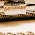 Возьмите Клатч BCBGMAXAZRIA Gold Tube clutch напрокат (Фото 4) в Москве