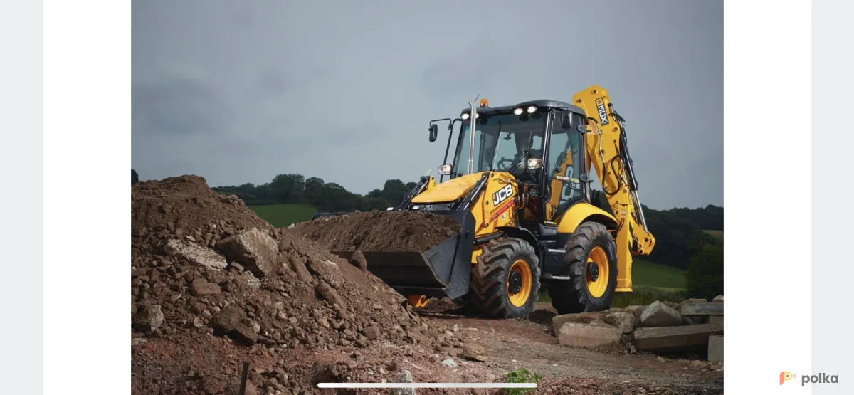 Возьмите Экскаватор погрузчик  напрокат (Фото 1) в Москве