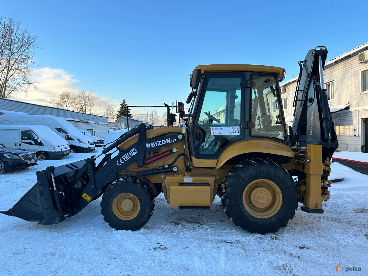 Возьмите Экскаватор погрузчик напрокат (Фото 1) в Москве