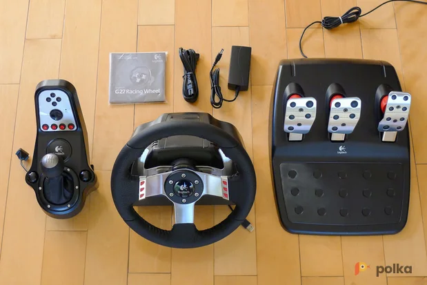 Возьмите Игровой руль Logitech G27 Racing Wheel с коробкой передач и педалями напрокат (Фото 1) в Москве