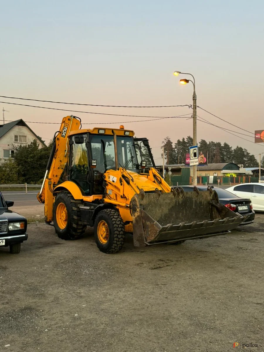 Возьмите Экскаватор-погрузчик JCB напрокат (Фото 1) в Москве