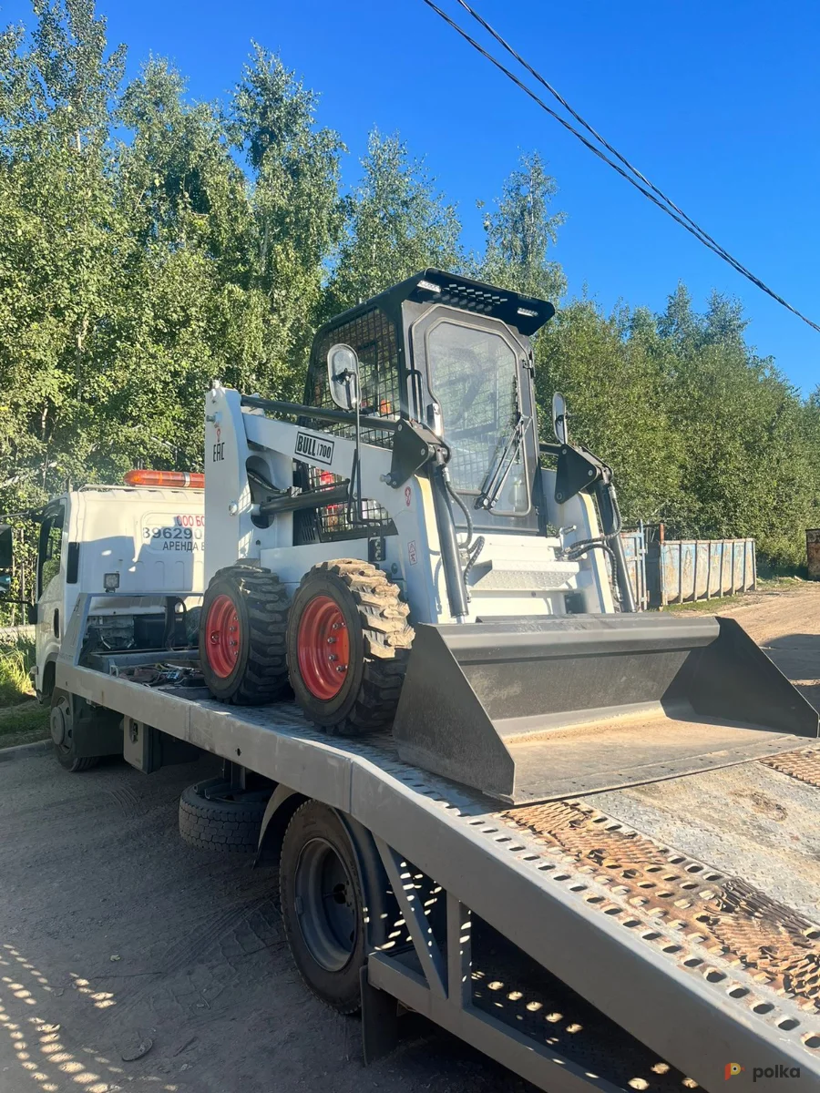 Возьмите Колесный мини погрузчик Bull SL700 напрокат (Фото 1) в Москве